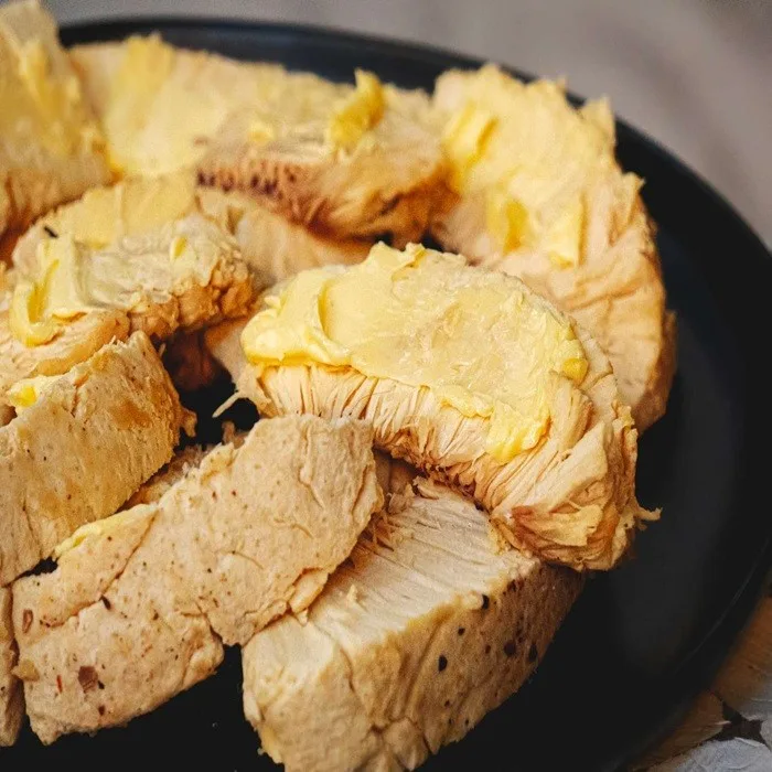 Broodvrucht in Botersaus