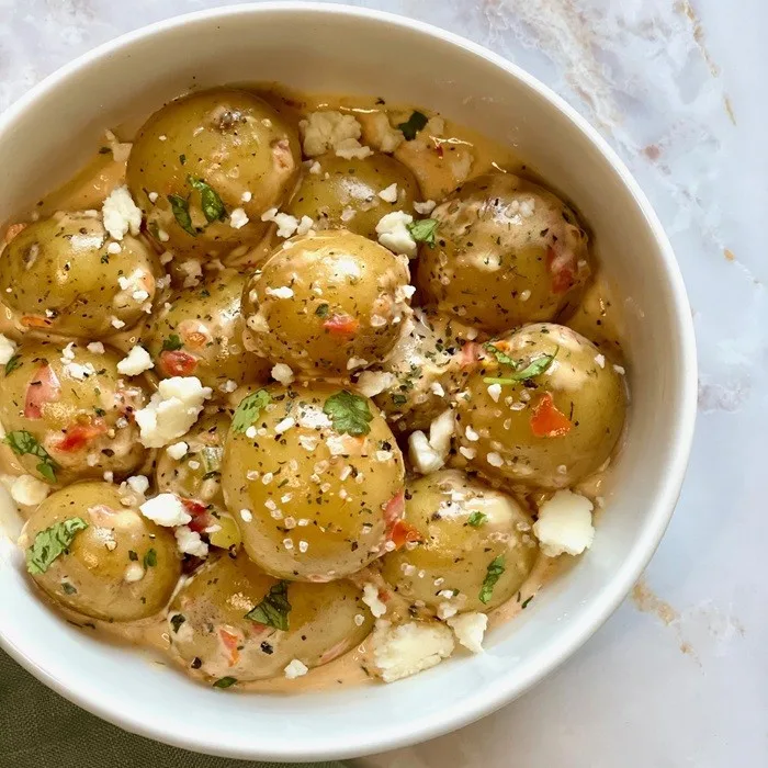 Papas Chorreadas (Aardappelen met Romige Kaassaus)